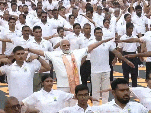 PM Modi performed Tadasana with the participants. The posture helps strengthen and straighten the spine.