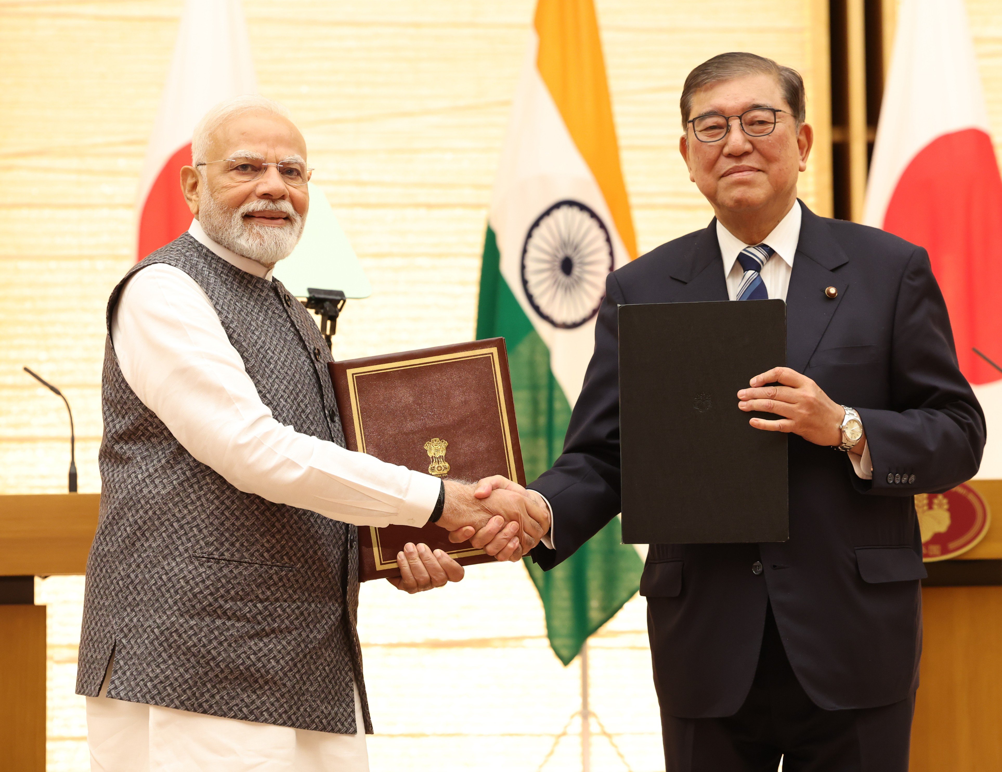 Indian Prime Minister Modi and Japan's then PM Shigeru Ishiba at the 15th India-Japan Summit.