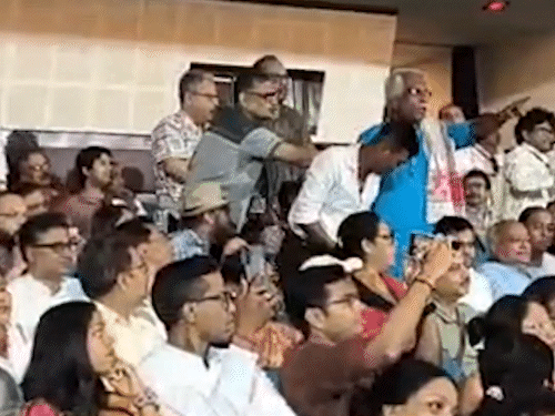 As soon as the poet Joy Goswami rose from his seat to the stage, a section of the audience started shouting loudly.