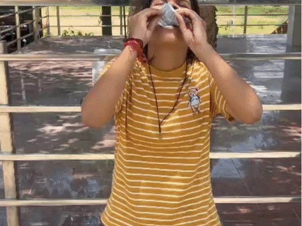 The video of the girl consuming poison in front of the police surfaced on Sunday. - Bhaskar English