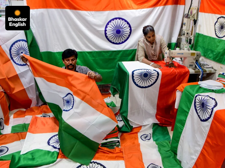 Mumbai workers put the finishing touches to India's Tricolours ahead of Independence Day celebrations