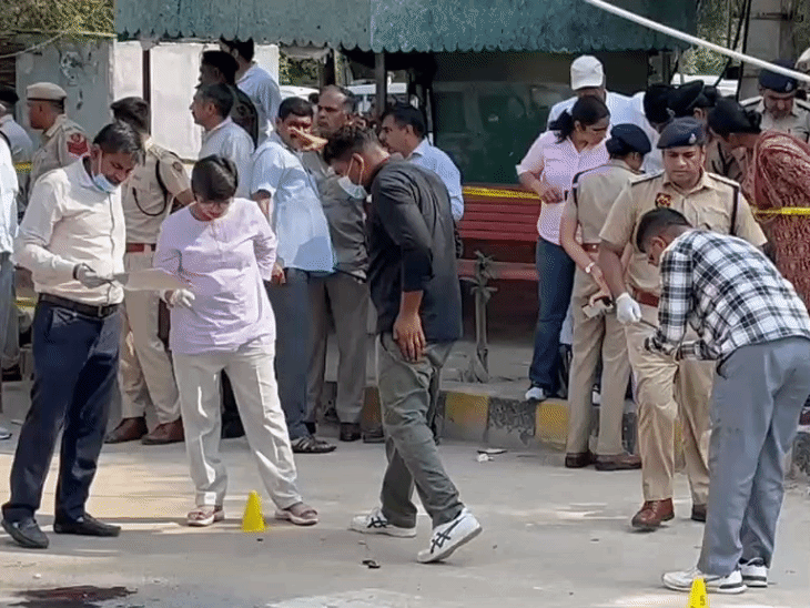 Police and forensic team collecting samples from the scene
