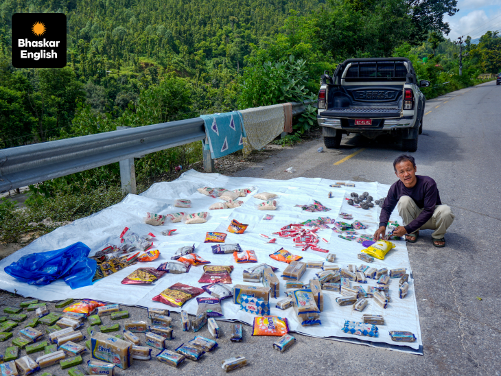 'Nepal’s flood aftermath': Shopkeeper dries flood-soaked household and shop belongings by the roadside