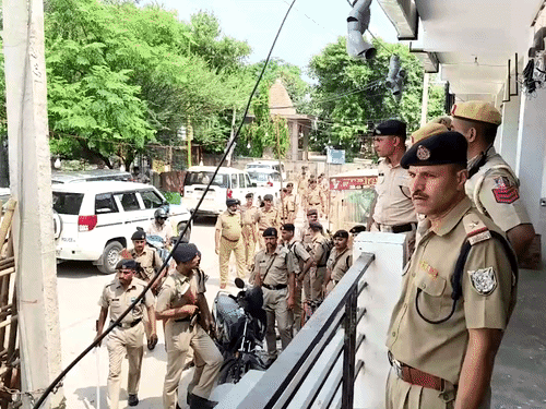 Police teams investigating the case. - Bhaskar English
