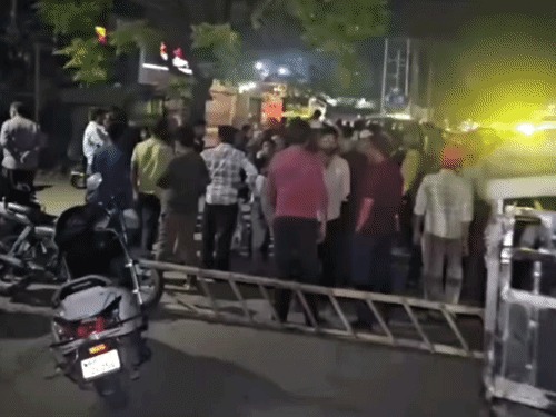 People blocked the road and protested at Chuna Bhatti Chowk in Jagadhri on Thursday night against the power outage.