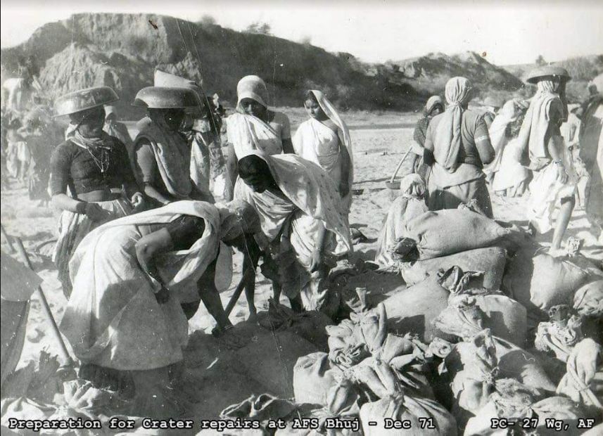 Women of Madhapar village repairing the military airport of Bhuj.