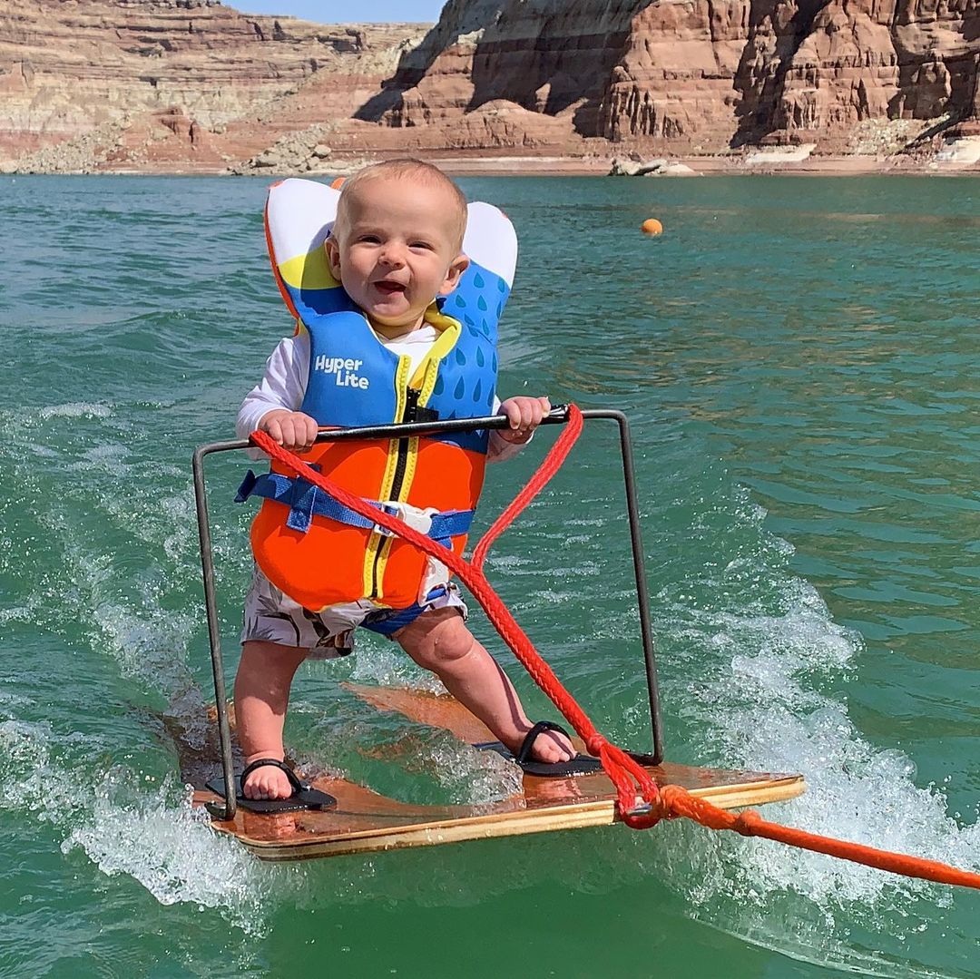 Little kid Rich Humphries goes water skiing.