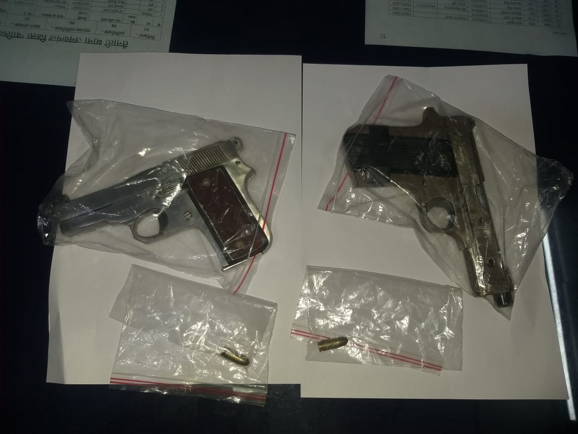 Pistol and cartridges recovered from miscreants