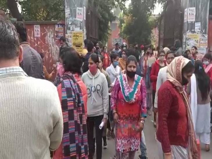 Candidates coming out after paper cancellation from an examination center in Meerut