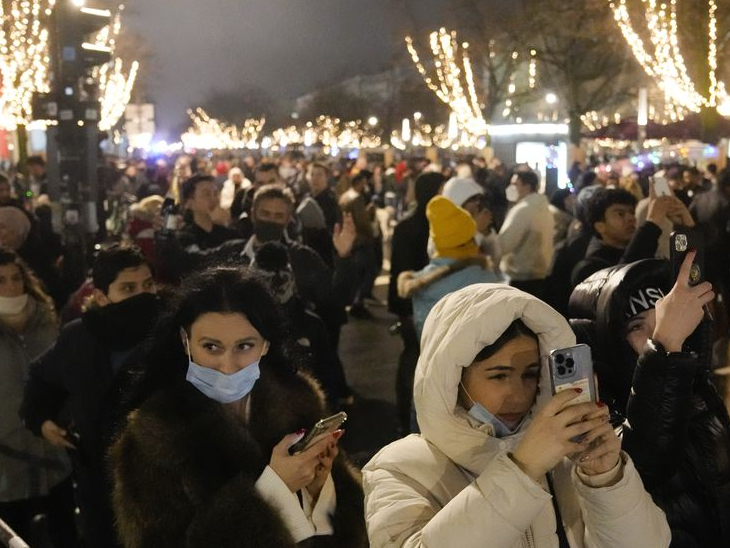 People gather to celebrate the New Year near the Brandenburg Gate in Berlin, Germany.
