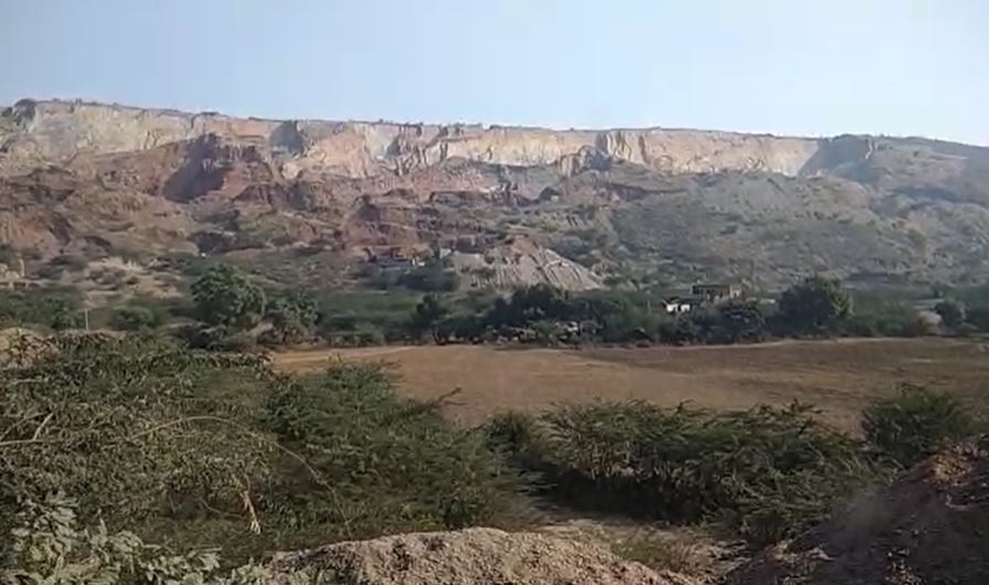 These are Adibadri and Kankanchal hills where legal mining was opposed. This area has now been declared protected. Baba had set fire to these mountains.