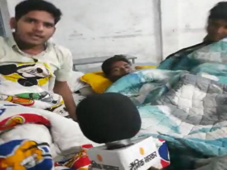 The people staying at the relief camp made the students' beds in the classroom.