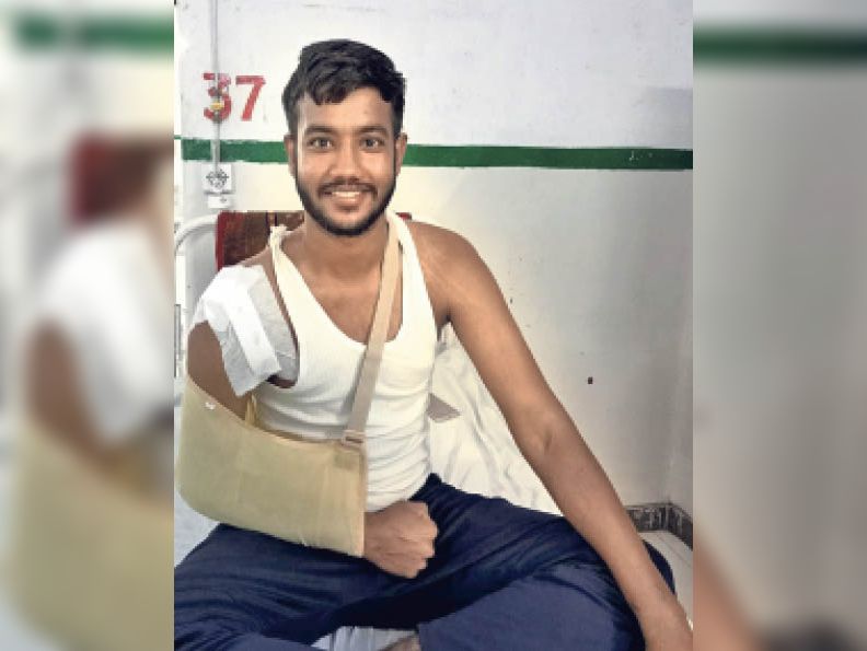 The shoulder of the young man was descending again and again, without ...