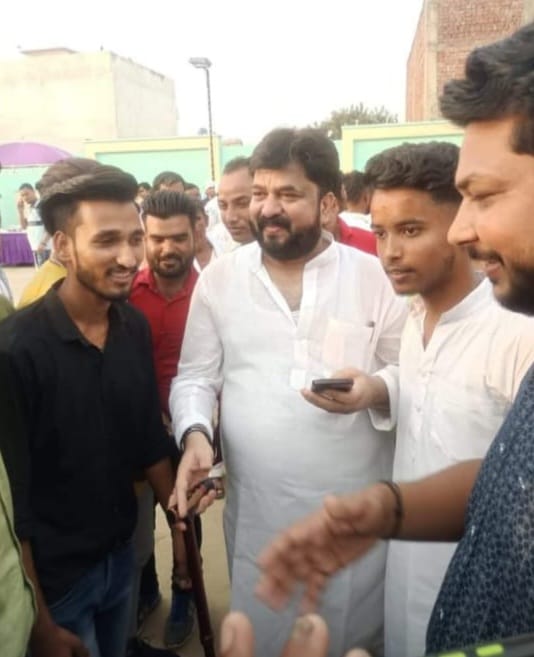 In new pictures, former minister Abid Raza is seen with police officers ...