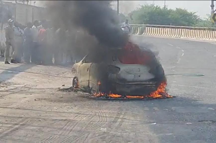 The car kept burning in the middle of the road for half an hour, it ...