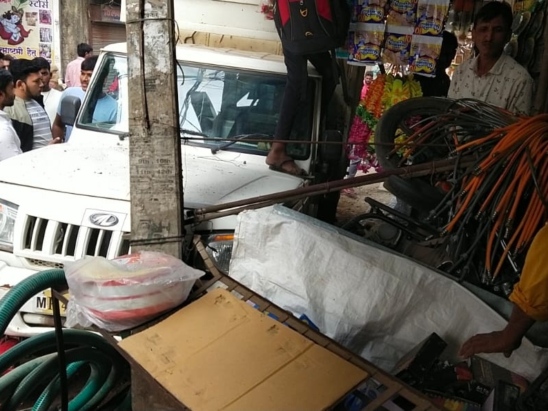 Trampled two bikes and entered the shop, also broke the electric pole