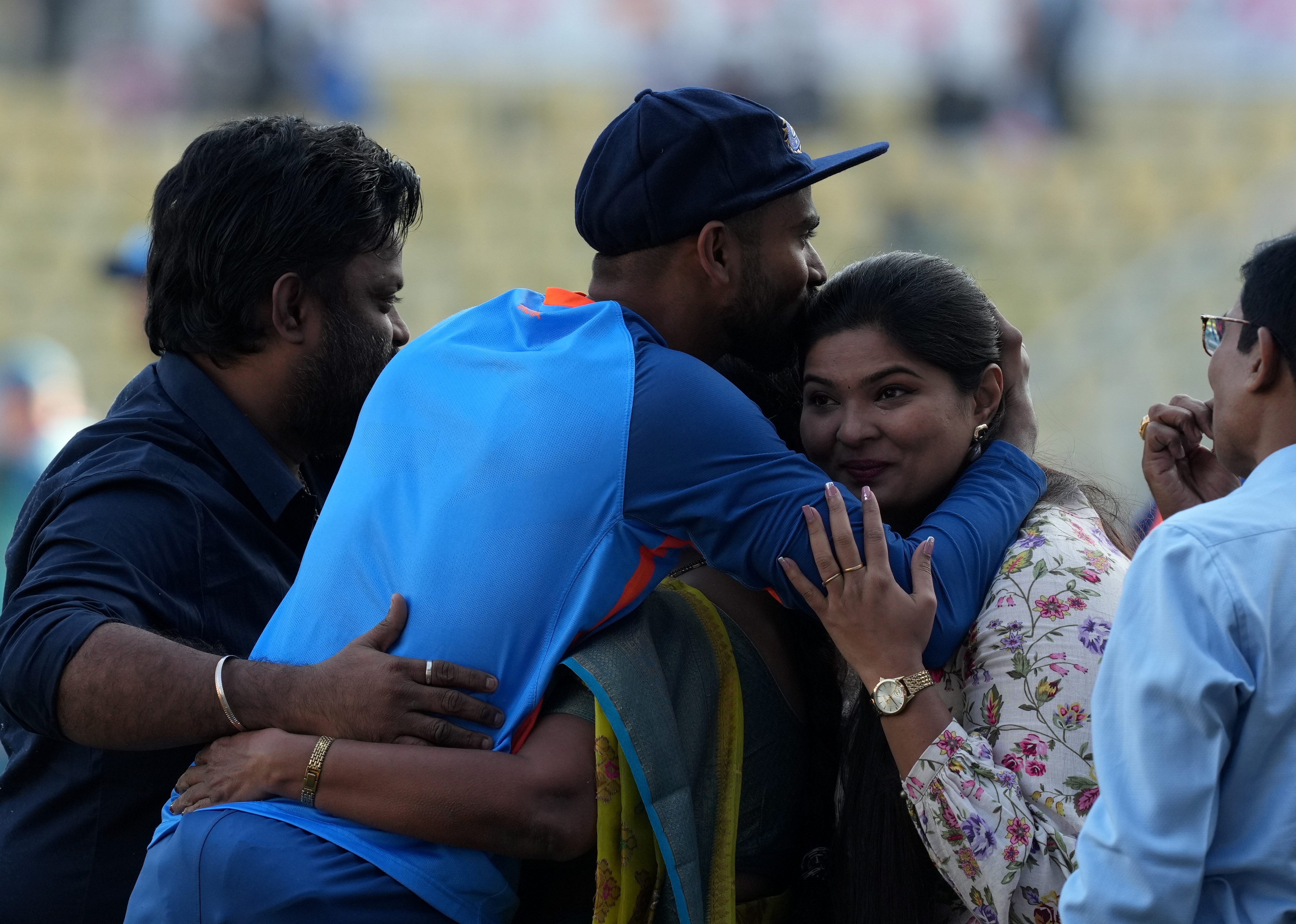 Wicketkeeper Shrikar Bharath with his family members after receiving his debut cap.