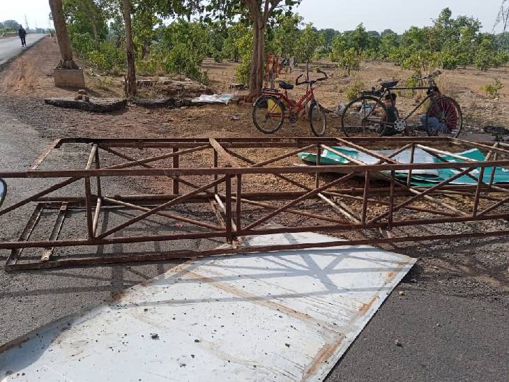Uncontrolled dumper damaged electric pole and sign board at night in