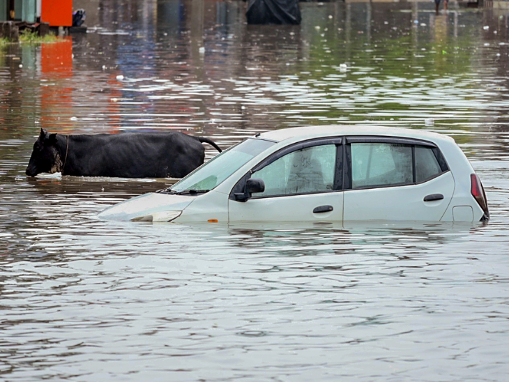 A car was completely submerged in water following heavy rains in Patiala.