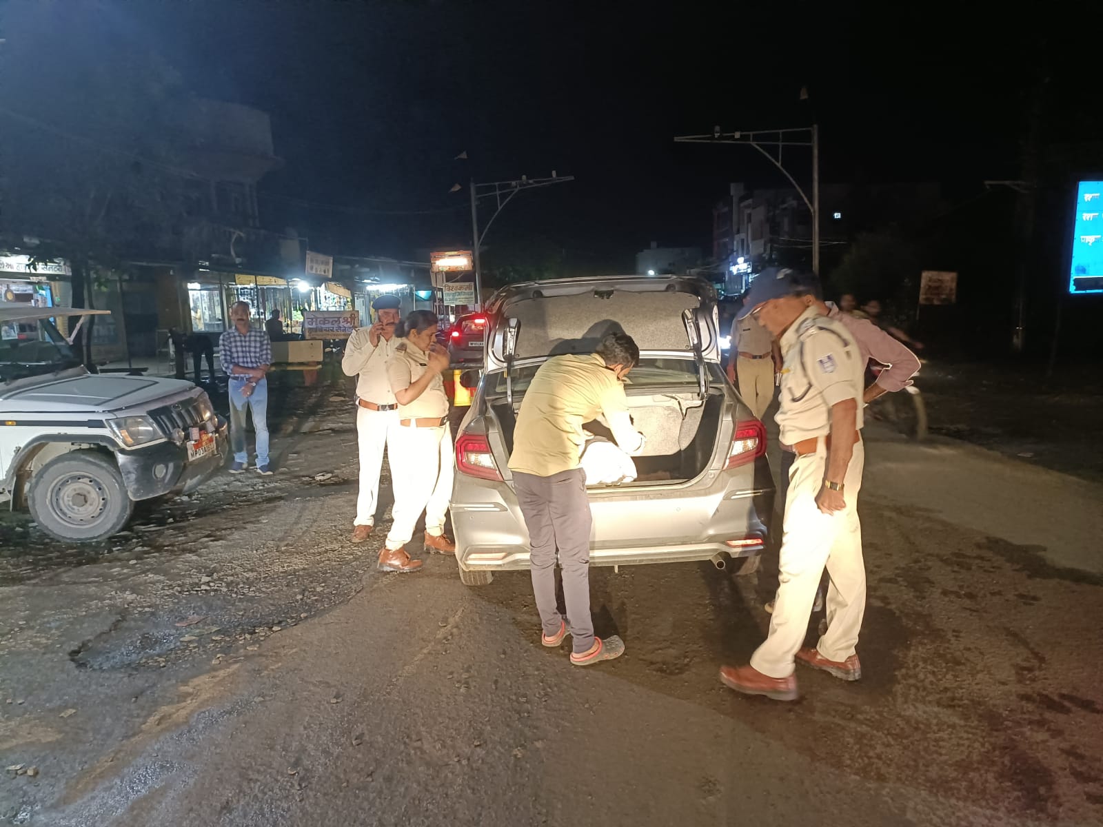 Sudden checking of bike and car in Narmadapuram