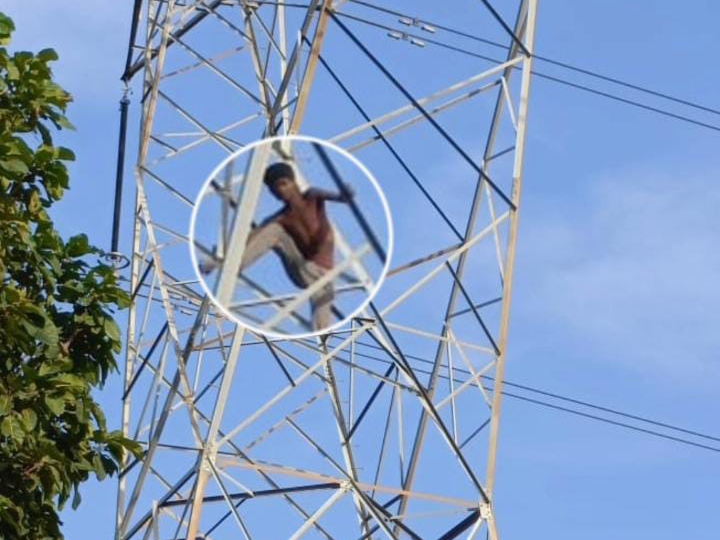 Young man climbed 84 feet high electricity tower to convince his wife ...