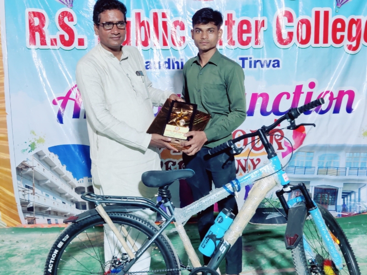 The student who secured a place in the merit board exam got a scooty.