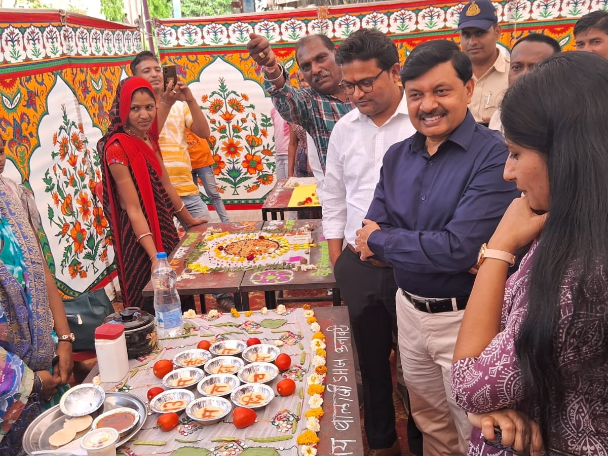 Food and Rangoli competition was organized. Message of voter awareness ...