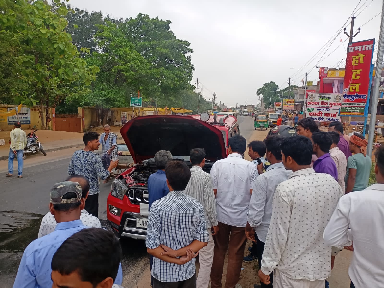Fire broke out in the engine of a car, controlled by efforts of ...
