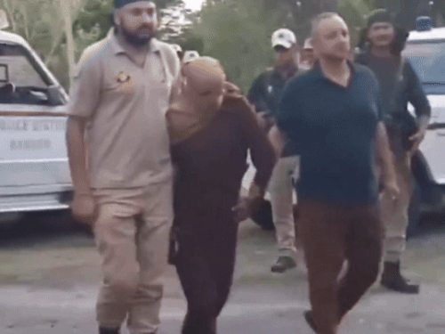 Police taking away the over ground worker who helped terrorists in carrying out the Reasi attack.