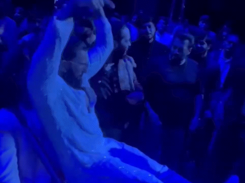 Ranveer Singh is seen dancing while sitting on the drum. All the guests danced heartily to the song Jumme Ki Raat Hai from Salman's film Kick at the sangeet ceremony.