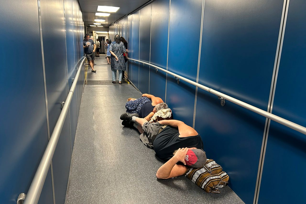 People fell asleep while waiting for a plane at Los Angeles International Airport.