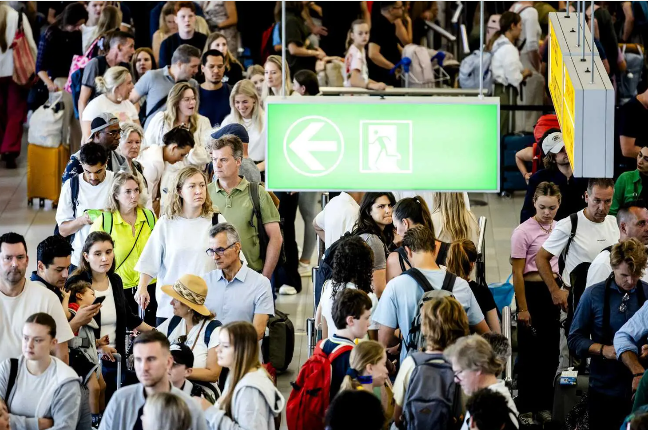 At Amsterdam airport too, people were seen waiting for services to resume.