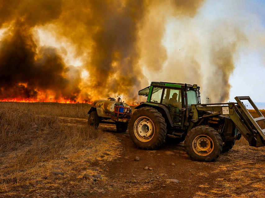 A field catches fire after a Hezbollah attack in the Golan Heights.