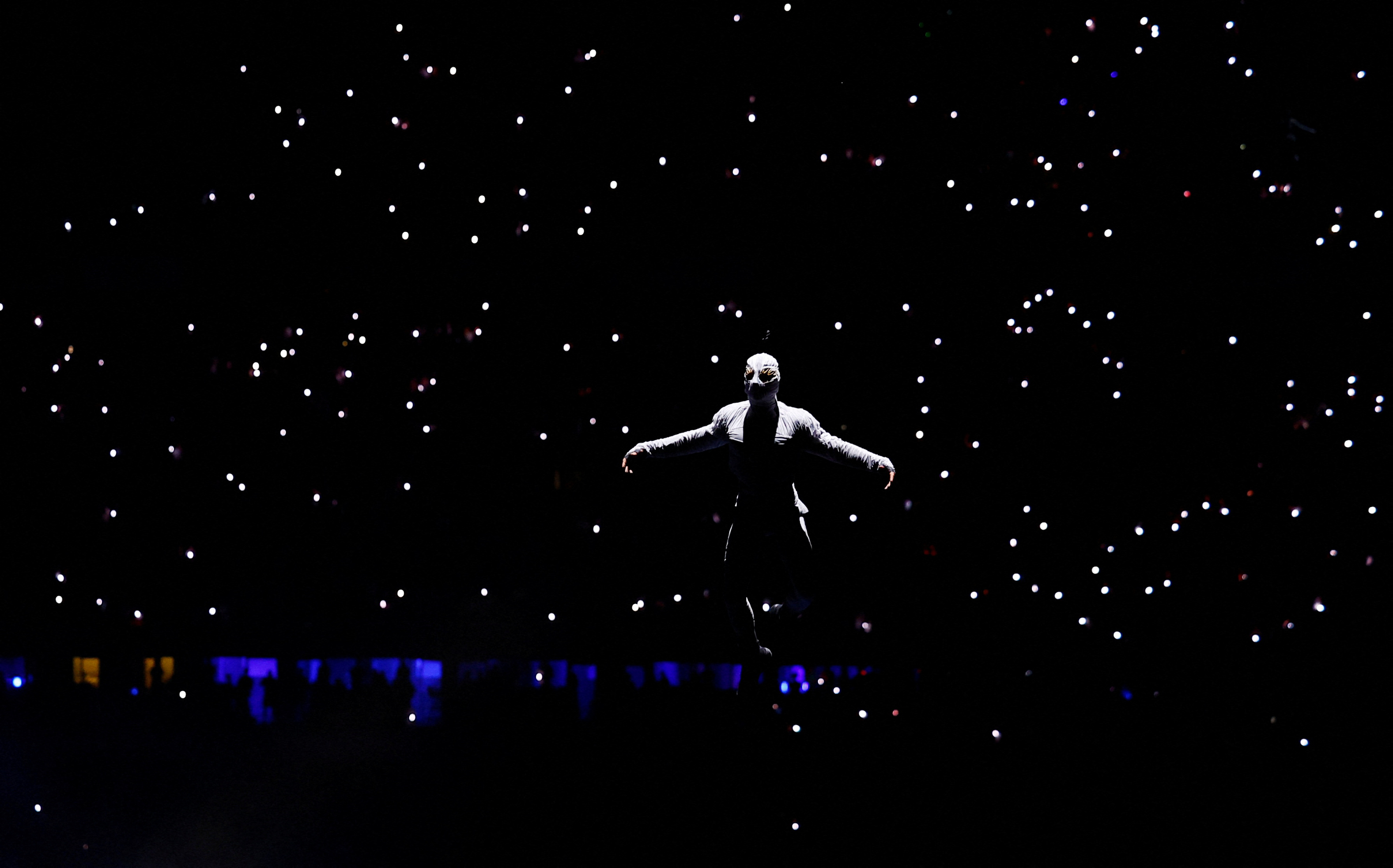 A dancer performing at the closing ceremony.