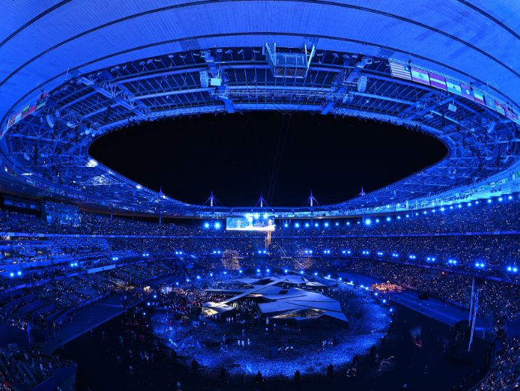 The stadium was lit up in blue during the ceremony.