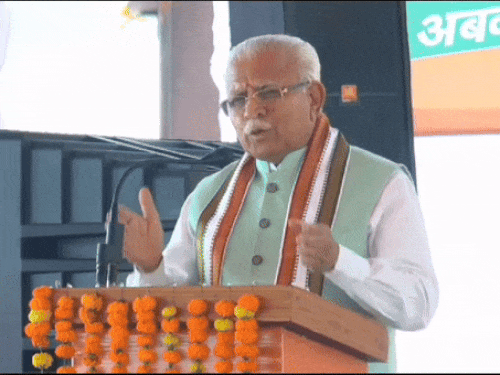 मनोहर लाल खट्‌टर और कुलदीप बिश्नोई।