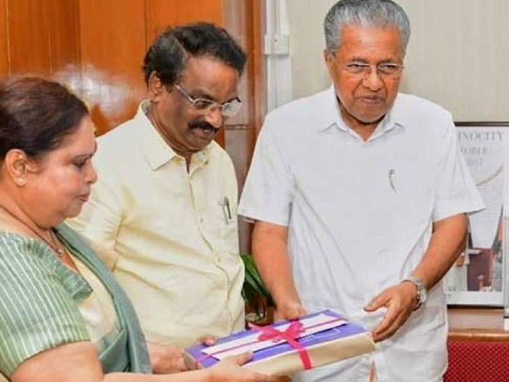 Justice Hema handing over the report to Kerala Chief Minister Pinarayi Vijayan.