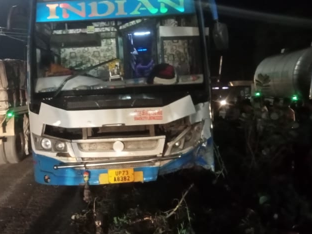 The passenger bus went out of control and climbed on the divider ...