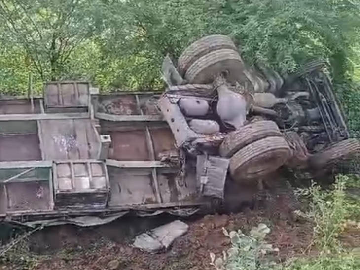 The trailer overturned in a ditch on the side of the road. Driver and ...