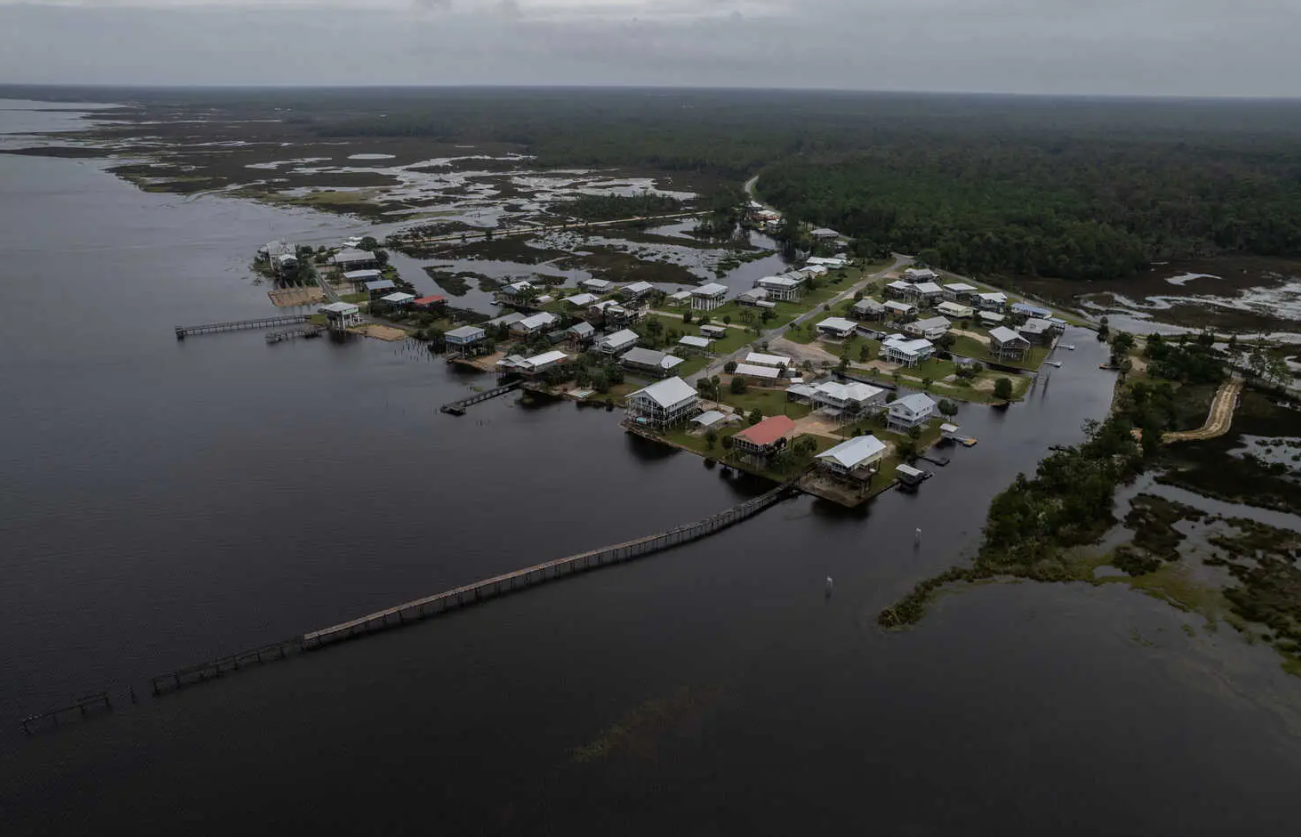 Pictured is Deckel Beach, Florida. All the houses in the area are submerged in water.