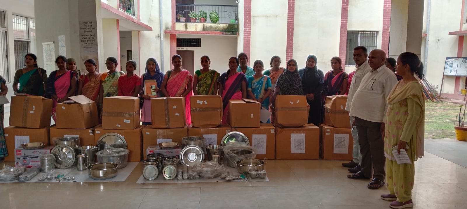 Steel kitchen set utensils distributed among Anganwadi workers