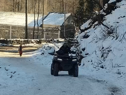 Tourist riding snow bike in Solang Nala, Manali. This bike does not slip in snow.