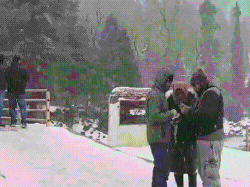 Jammu and Kashmir: Tourists enjoying snowfall in Ganderbal.