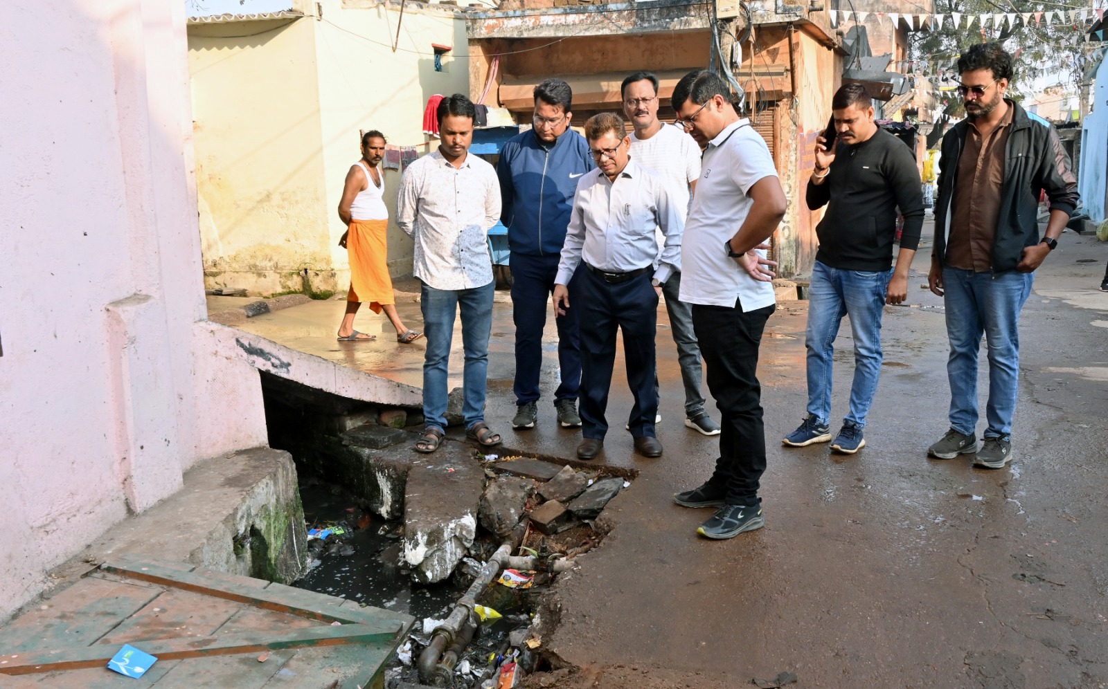 Issue notices to encroachers on both sides of the canal road and take ...