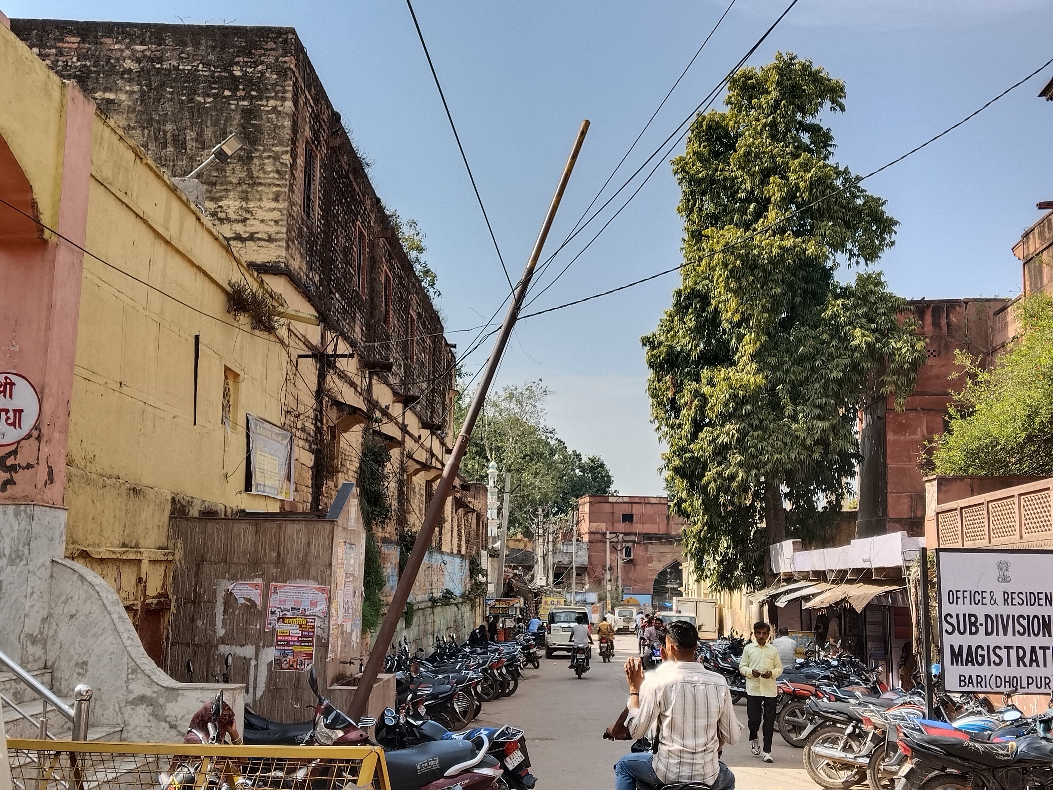 An electric pole is in a dilapidated condition in front of the SDM ...
