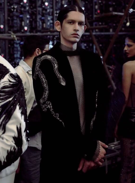 Lakshya Singh walking the ramp for designer Gaurav Gupta.