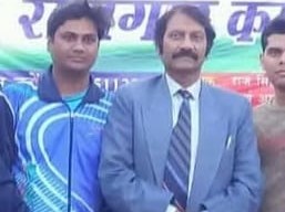 पूर्व डीजीपी के साथ सुरेश का फोटो।