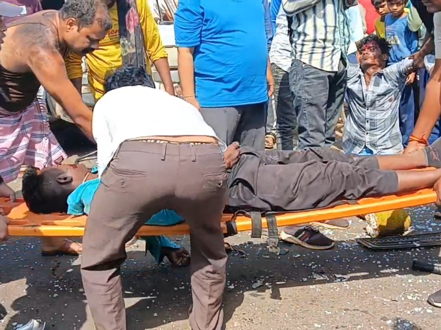 Two youths returning after distributing wedding cards collided with a van