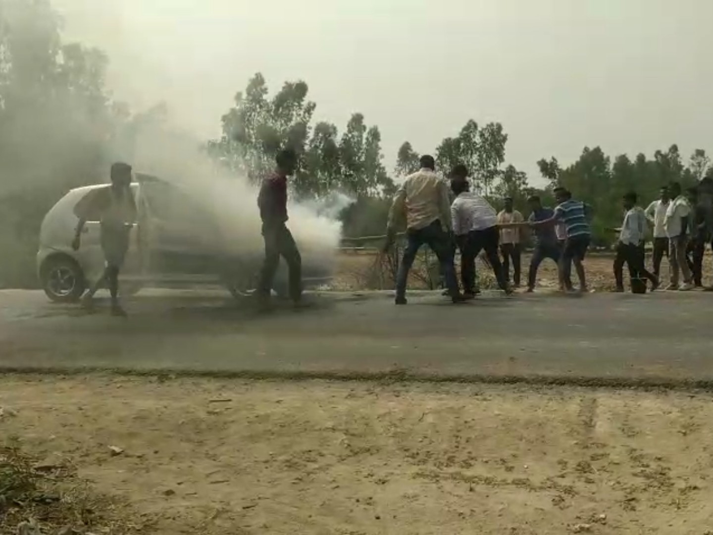 The car of a family returning from a wedding caught fire