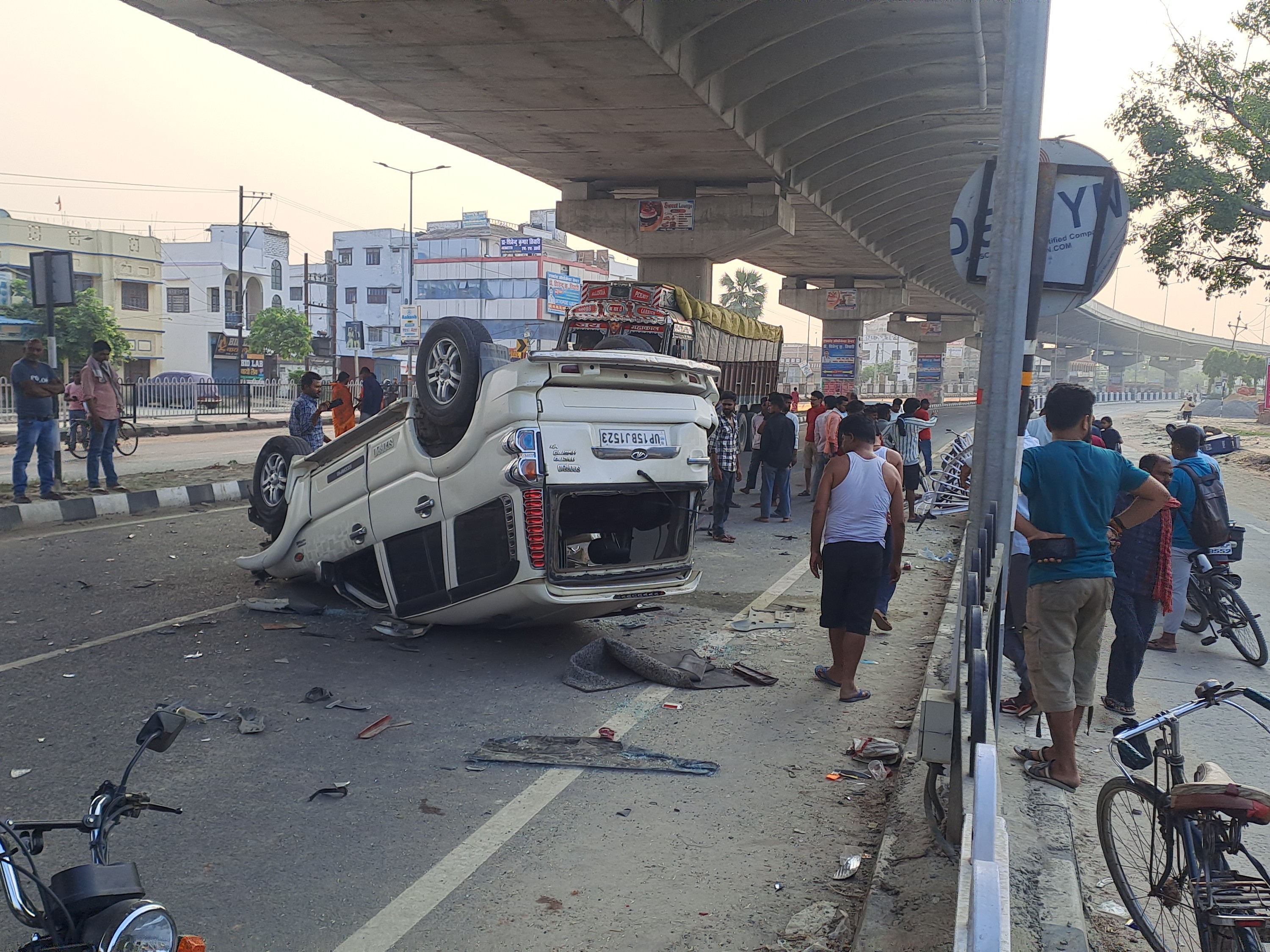 While overtaking Scorpio collided with divider then broke grill and ...